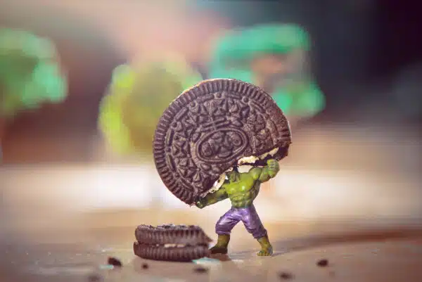 How Foods Affect Your Physical and Mental Health - Hulk lifts a cookie